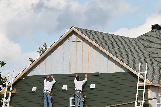 Professional Siding Contractor technician working in North Fairfield, OH